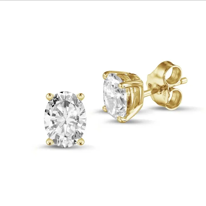 2.00 quilates pendientes solitario diamante talla oval en oro amarillo 