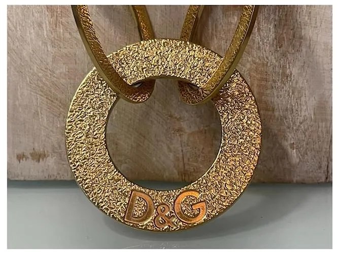 Fabuloso conjunto modelo DOLCE & GABBANA “Whisp” en acero dorado 
