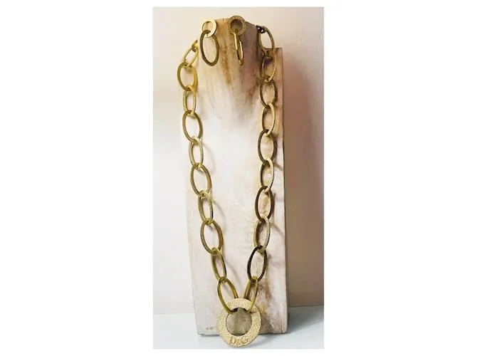 Fabuloso conjunto modelo DOLCE & GABBANA “Whisp” en acero dorado 