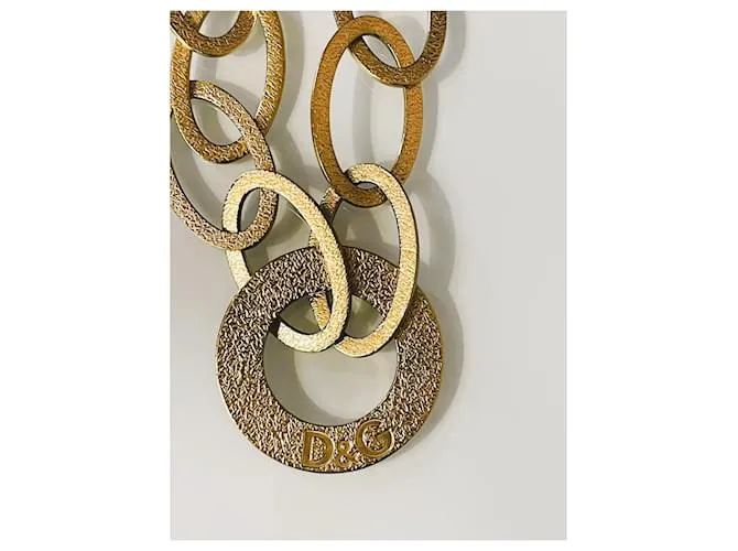Fabuloso conjunto modelo DOLCE & GABBANA “Whisp” en acero dorado 