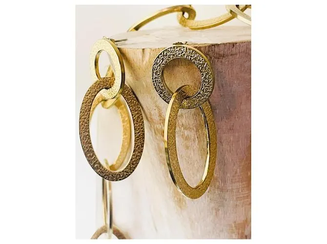 Fabuloso conjunto modelo DOLCE & GABBANA “Whisp” en acero dorado 